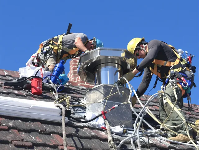 Protective chimney cap installed by Derby Chimney Sweep in Derby, CT